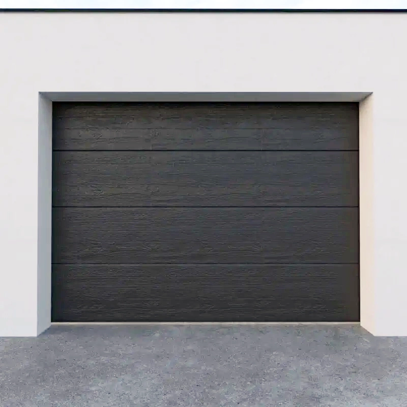 Porte de garage sur mesure posée à Vironvay par Atout Menuiserie